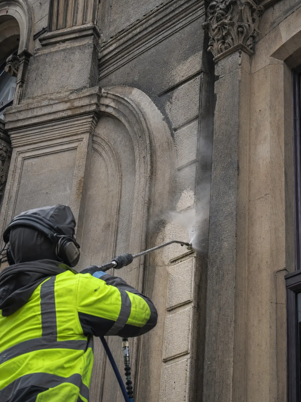 TORC cleaning a period stone facade